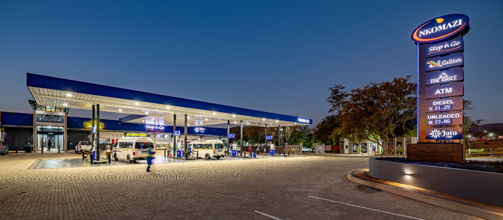 Nkomazi service station forecourt at dusk