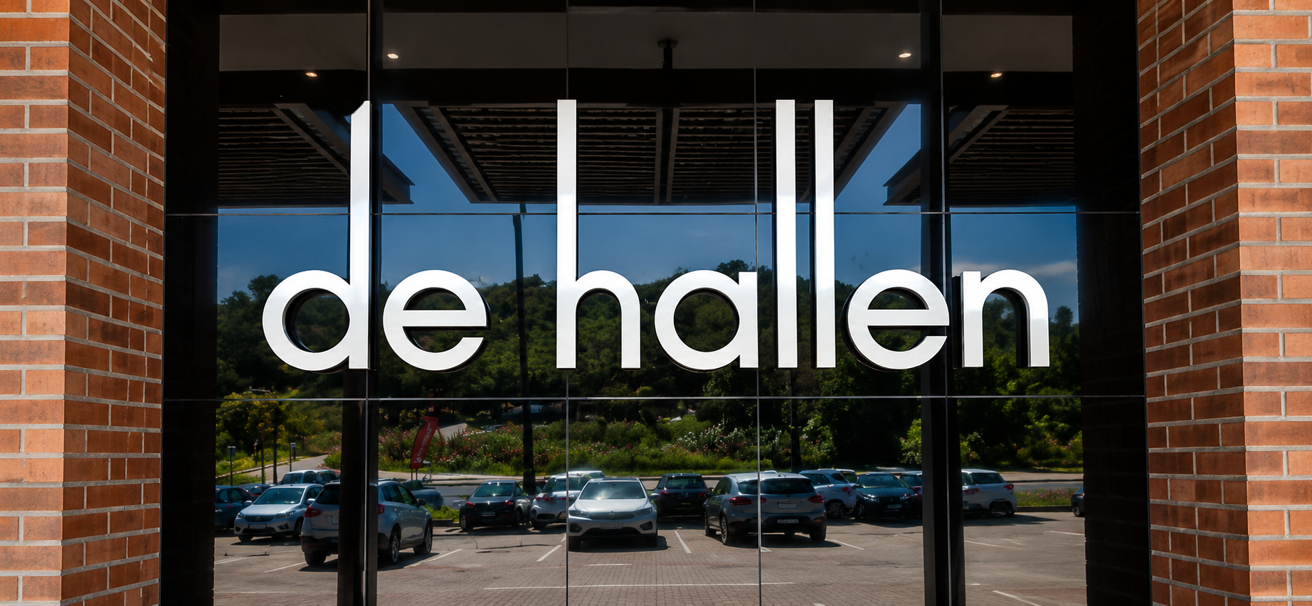 De Hallen illuminated storefront lettering