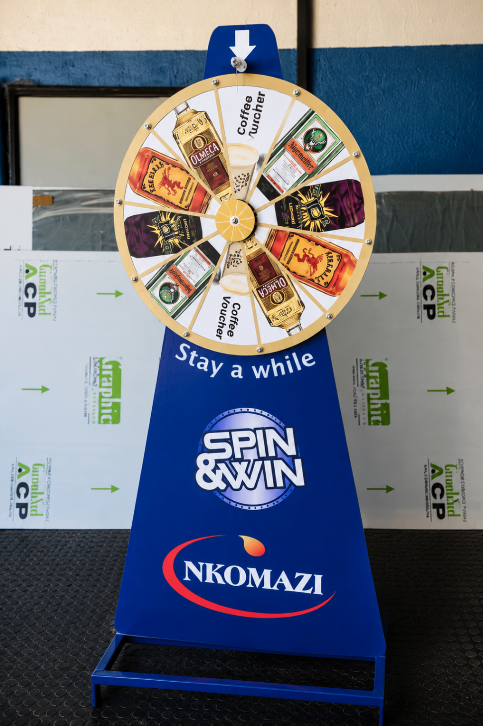 Branded spin and win display stand
