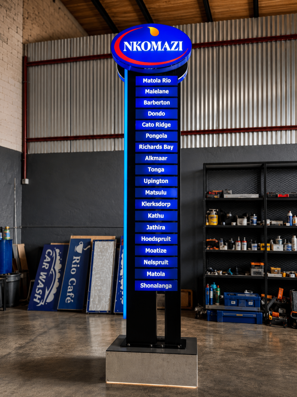 Tall illuminated forecourt pylon sign